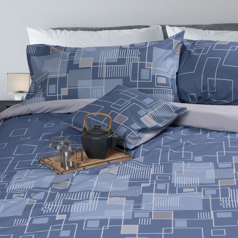 Completo letto in cotone con stampa geometrica blu e grigia con cuscino arredo