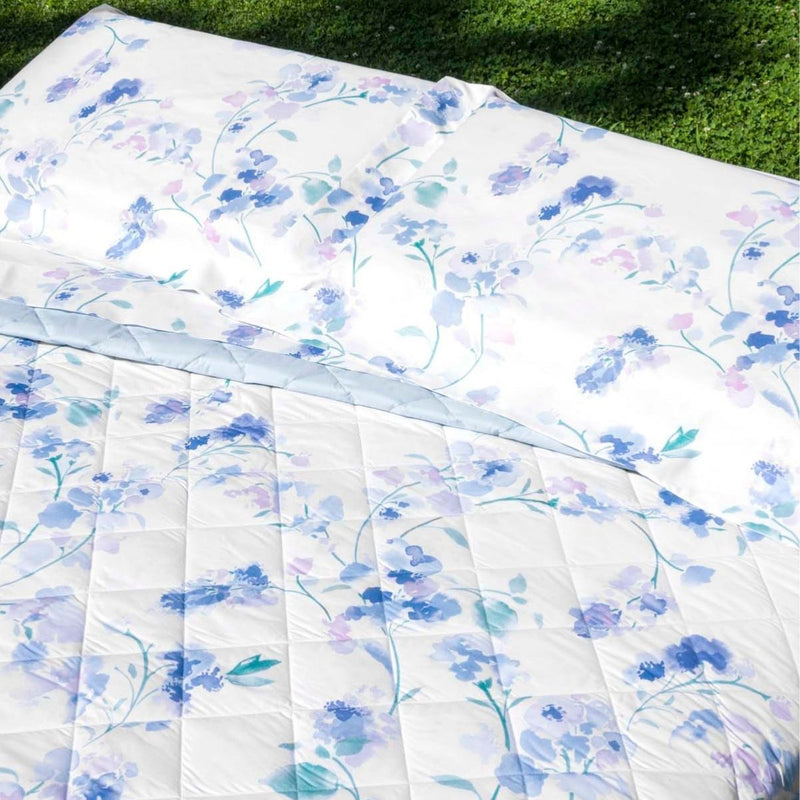 Completo letto Polissena in percalle di cotone Cassera casa con stampa floreale blu