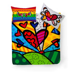 Parure Copripiumino Heartbeat Britto con i vivaci disegni del noto artista internazionale Romero Britto su 100% cotone.