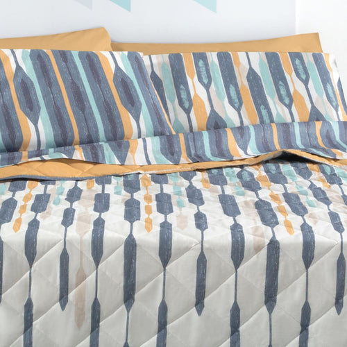 Completo letto in cotone con stampa geometrica di losanghe blu azzurro e ocra